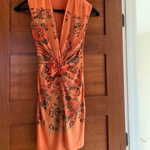 Orange dress with tattoo style roses.